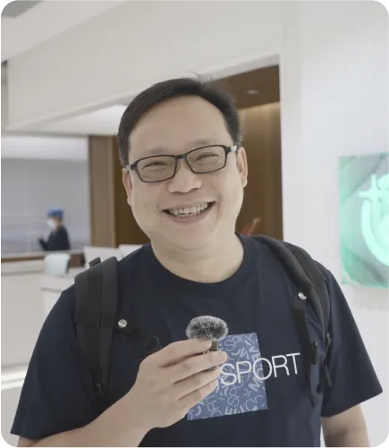 James smiling for a Beame customer portrait